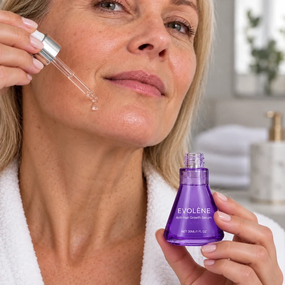Applying Evolène serum to the chin